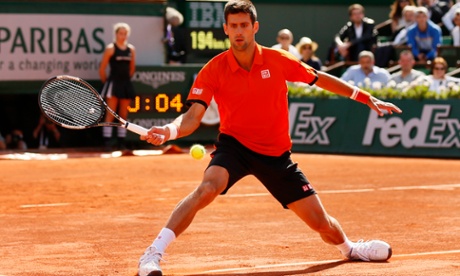 Novak Djokovic chases down a shot against Richard Gasquet.