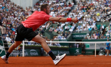 Jack Sock strains to get a return against Rafael Nadal.