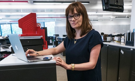 Esther Addley writing standing up