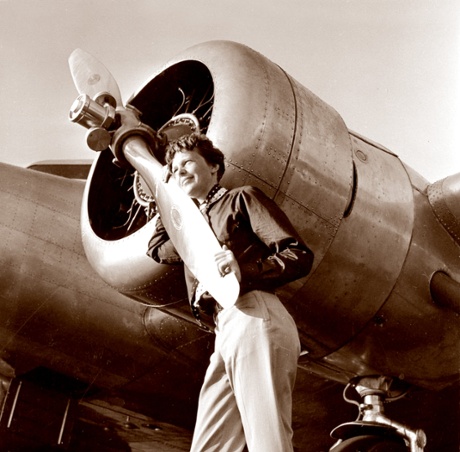Earhart next to the propeller of her Model 10E Electra
