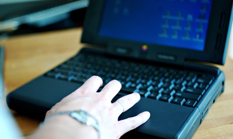 Woman's hands on a computer keyboard