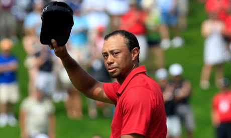 A solemn Tiger Woods acknowledges the crowd on the 18th hole during the final round of The Memorial Tournament.
