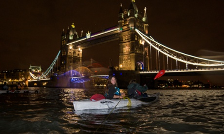Night kayaking down the Thames. 