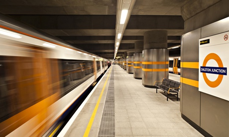 The London Overground leaves Dalston Junction station.