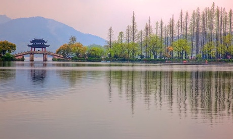 A causeway bridge and walkway at West Lake, Hangzhou.