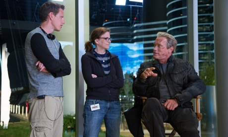 Schwarzenegger on set with producers David Ellison and Dana Goldberg.
