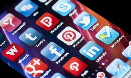 The Twitter app, alongside other social networks on an iPhone.