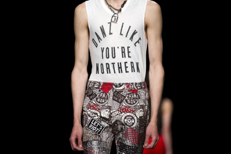 A model wearing a vest on the Topman Design catwalk