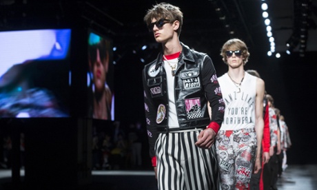A model in a patched jacket on the Topman catwalk at London Collections Men