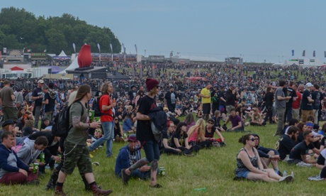 Festivalgoers at Download festival in Donington Park,  Leicestershire, who may be 'papped. Their sweaty mugs are then compared to other mugs in a mainframe.'
