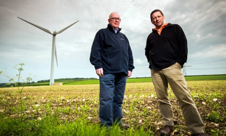 Bob Carnell (left) and John Zamik with a wind turbine in a field near Hinton, just outside Bristol.