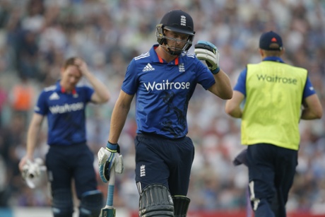 Josh Buttler walks after edging behind to Ronchi.