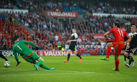Gareth Bale scores the opener in Cardiff.