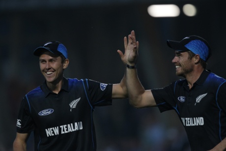 Trent Boult and Tim Southee celebrate the wicket of Adil Rashid.