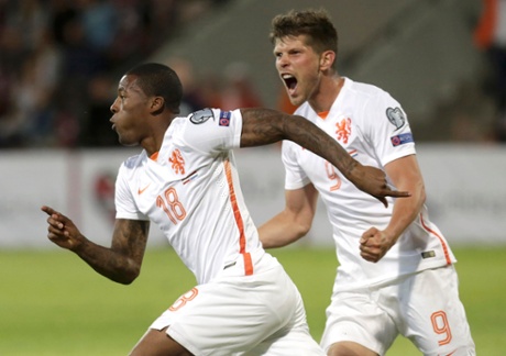Netherlands' Georginio Wijnaldum celebrates with Klaas-Jan Huntelaar in Riga.