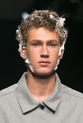 Lather up: a model covered in party foam at Christopher Shannon