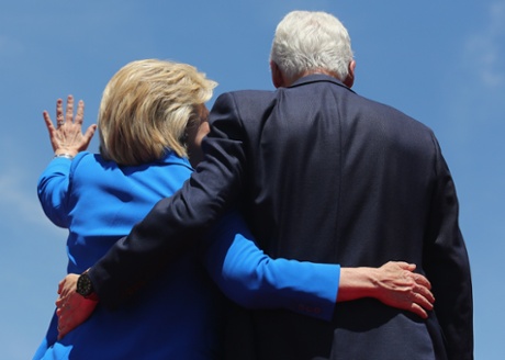 Hillary and Bill embrace.