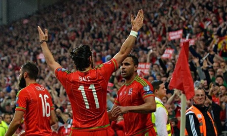 Gareth Bale and Wales team-mates celebrate Bale's 25th-minute goal against Belgium