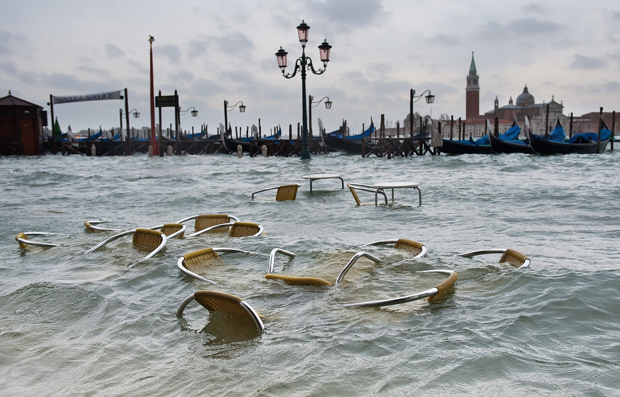 A history of flooding in the sinking city of Venice in pictures