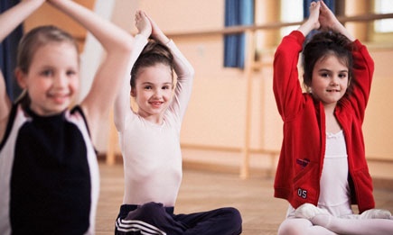 Young girls in meditation pose