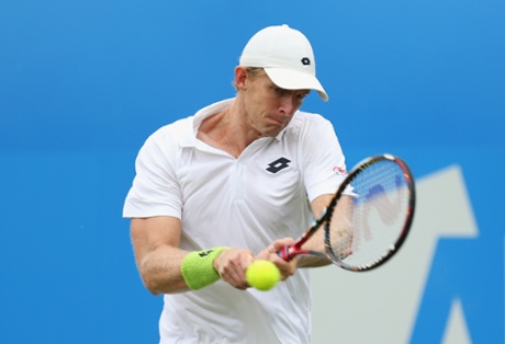 Kevin Anderson plays a backhand.