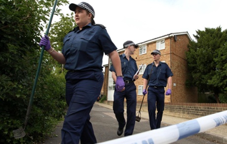 Metropolitan police officers conducting a knife crime investigation in Thornton Heath.