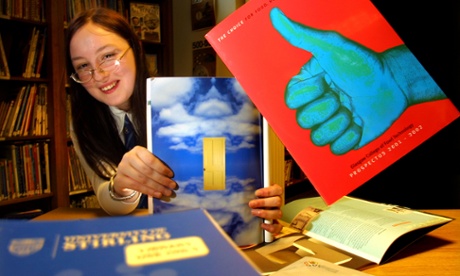 student reading prospectuses