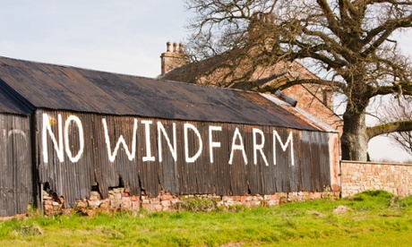 A wind farm protest sign near Carlisle. The UK government is cutting subsidies for new onshore windfarms.