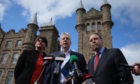 The DUP’s Arlene Foster, leader Peter Robinson and Nigel Dodds, in front of Stormont amid talks earlier this month on how to save the deal, made in December, to agree welfare cuts in return for a Treasury loan.