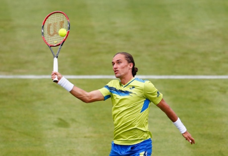 Alexandr Dolgopolov volleys a return.