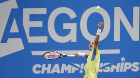 Alexandr Dolgopolov serves.