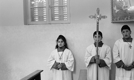 Altar boys and girl serving the Easter mass, near Ajloun, Jordan. (March 2013).