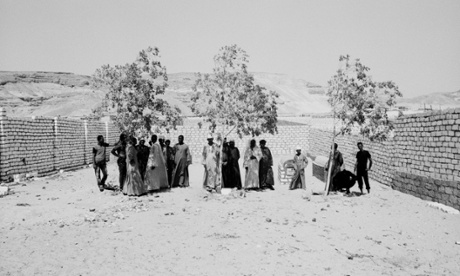 A funeral in Deir Abu Hennis, Egypt, where many of the inhabitants have never left the village (July 2012). Photograph: Davide Di Gianni