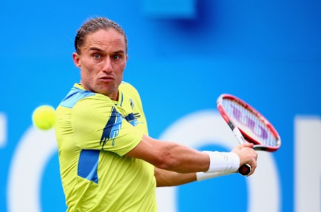 Alexandr Dolgopolov gets ready to unleash a backhand in Nadal's direction.