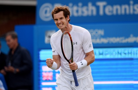 Andy Murray celebrates after winning his first round match.