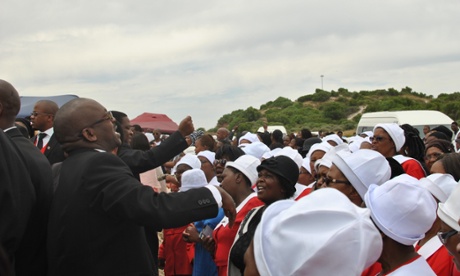 Mourners sing at a Khayelitsha funeral.