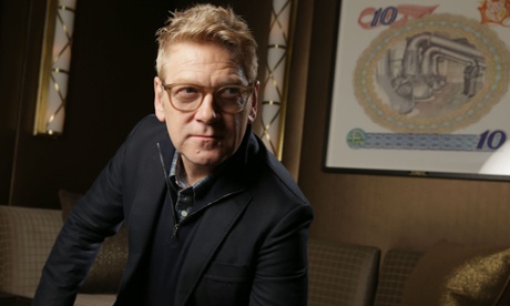 Kenneth Branagh in Beverley Hills in 2013 … on the wall behind appears to be a picture by Eric Ravilious, whose most famous painting, Train Landscape, shows a railway carriage.