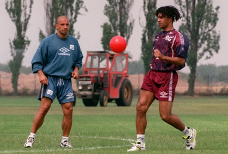 Gianluca Vialli, the son of a millionaire, goes through exercises with Ruud Gullit at Chelsea training session in 1996.