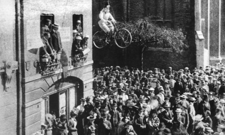 An effigy of a woman on a bicycle