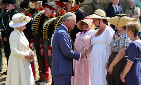Charles, Prince of Wales, and his wife Camilla, Duchess of Cornwall, greet re-enactors as they attend the ceremonial opening of Hougoumont Farm in Braine-l'Alleud, near Waterloo, Belgium.