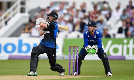 Mitchell Santner slogs the ball for six.