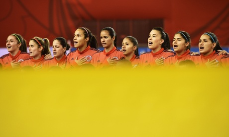 The Colombian team belts out their national anthem.