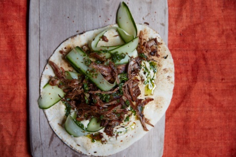 Crisp lamb breast wrap with cucumber and tahini