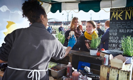 customer being served at market stall