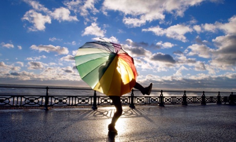 person dancing with umbrella