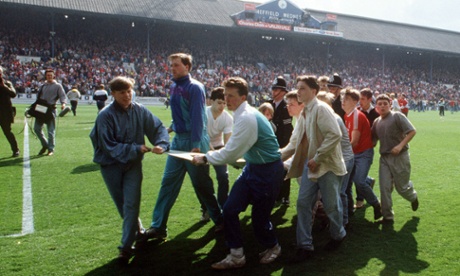 Advertising hoardings were used as stretchers to carry victims of the disaster.