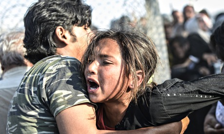 Syrians fleeing the war at the Turkish border