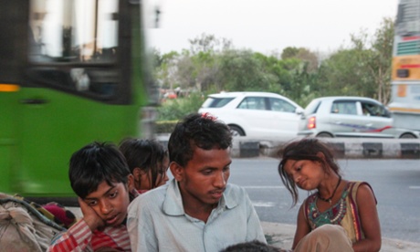 The Yunus family at home on their patch of concrete. Photograph: Neha Tara Mehta