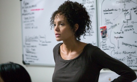 A darkened and frizzed Angelina Jolie as Mariane Pearl in A Mighty Heart. Photograph: Peter Mountain