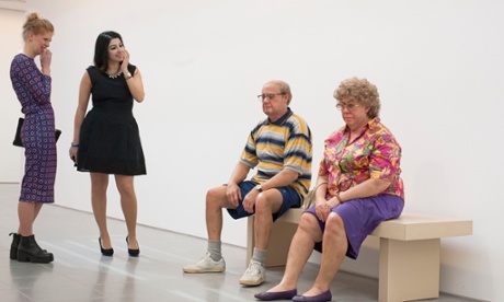 Visitors to the Serpentine Sackler Gallery observe Old Couple on a Bench 1994, a lifelike sculpture by Duane Hanson.